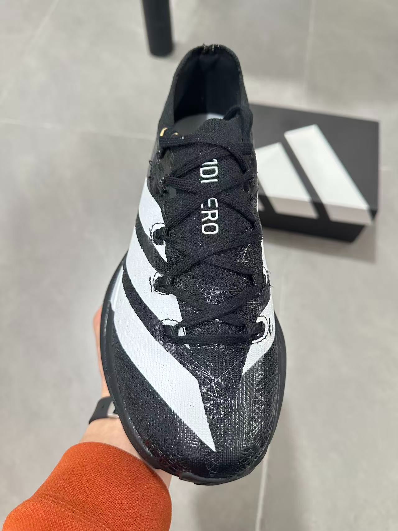 Adidas ADIZERO EVO SL Core Black / Cloud White colorway