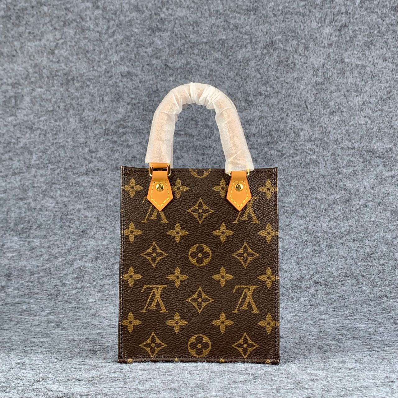 LV PETIT SAC PLAT  BROWN