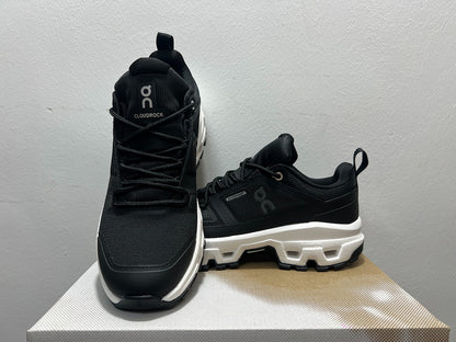 On Cloudrock Low Waterproof Hiking Shoes in Black / White