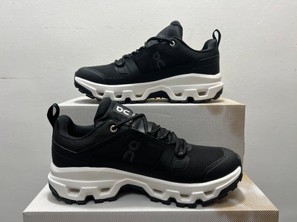 On Cloudrock Low Waterproof Hiking Shoes in Black / White