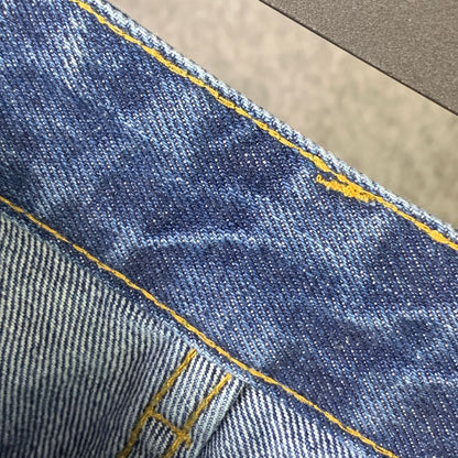 CHROME HEARTS Blue Jeans With Black Leather Crosses