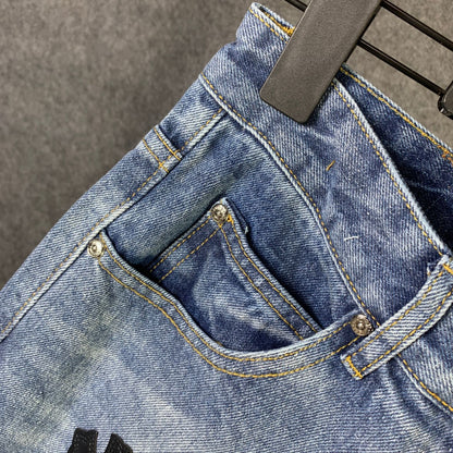 CHROME HEARTS Blue Jeans With Black Leather Crosses
